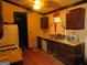 Functional kitchen featuring wooden cabinetry, a double-basin sink, and basic appliances at 7755 Chase Woods Dr, Jonesboro, GA 30236