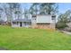 Charming home featuring a well-maintained lawn and unique architecture at 3417 Little Beth Ct, Decatur, GA 30034