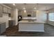 Modern kitchen with gray cabinets, granite countertops, a kitchen island, and stainless steel appliances at 5314 Tolar Rd # 23, South Fulton, GA 30213