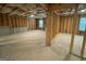 Unfinished basement with concrete floor, exposed insulation, and framed walls offering customization potential at 5343 Tolar Rd # 58, South Fulton, GA 30213