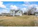 Exterior of home with large backyard and attached two-car garage at 825 Karie Dr, Mcdonough, GA 30253