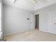 Large bedroom with ensuite access, featuring neutral walls and carpeted floors at 825 Karie Dr, Mcdonough, GA 30253