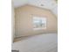 Bedroom with neutral paint, carpet, and window overlooking the backyard at 825 Karie Dr, Mcdonough, GA 30253