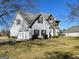 Inviting two-story home with a two-car garage, situated on a well-maintained lawn at 825 Karie Dr, Mcdonough, GA 30253