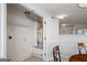 Utility closet featuring a water heater, shelving, and a louvered door at 825 Karie Dr, Mcdonough, GA 30253