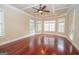 Spacious living room featuring gleaming hardwood floors and a tray ceiling at 125 Westgreen Way, Tyrone, GA 30290