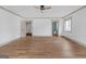 Spacious bedroom with hardwood floors and two doorways at 6274 Booker Ln, Lithonia, GA 30058