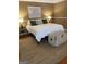 Cozy bedroom with neutral tones, a plush rug, and ample natural light at 200 Timber Ridge Dr, Mcdonough, GA 30252