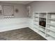 Bonus room with decorative wall art, built in bench, and shelving at 200 Timber Ridge Dr, Mcdonough, GA 30252