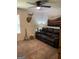 Relaxing living room with a plush leather sofa and a decorative rug at 200 Timber Ridge Dr, Mcdonough, GA 30252