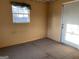 Cozy room features a window offering natural light at 376 Lakewood Dr, Social Circle, GA 30025