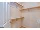 Empty closet with shelves and wood supports. Door is white with gold hardware at 195 Youngs Cir, Fayetteville, GA 30215