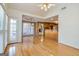 Open concept dining room with hardwood floors, neutral walls, and access to the kitchen at 195 Youngs Cir, Fayetteville, GA 30215