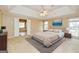 Nicely decorated main bedroom featuring a decorative rug, a large window and stylish furniture at 195 Youngs Cir, Fayetteville, GA 30215