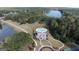 Aerial view of home with community pool and lake nearby at 130 Dockside Dr # 380, Fayetteville, GA 30215