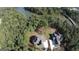 Aerial view of homes surrounded by lush green trees at 130 Dockside Dr # 380, Fayetteville, GA 30215
