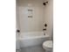 Bright bathroom features white subway tile shower with matte black fixtures at 130 Dockside Dr # 380, Fayetteville, GA 30215