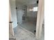 Contemporary bathroom featuring glass enclosed shower with marble tile surround and floor at 130 Dockside Dr # 380, Fayetteville, GA 30215