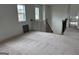 Large carpeted bonus room on 2nd floor with stairs at 130 Dockside Dr # 380, Fayetteville, GA 30215
