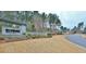 Stone entrance to The Canoe Club community with lush landscaping and well-maintained grounds at 130 Dockside Dr # 380, Fayetteville, GA 30215