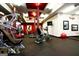 A community gym and yoga room with exercise equipment, tv and yoga accessories at 130 Dockside Dr # 380, Fayetteville, GA 30215