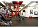 Community gym featuring modern exercise equipment, mirrored walls, and a dedicated yoga space at 130 Dockside Dr # 380, Fayetteville, GA 30215