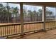 Covered porch featuring wood flooring and great backyard views at 130 Dockside Dr # 380, Fayetteville, GA 30215