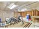 Unfinished basement space shows potential for customization and storage, with exposed framing and ample room at 25 Grange Way, Sharpsburg, GA 30277