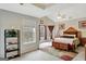 Bedroom showcasing a bed, nightstands, and a dresser with decorative details at 25 Grange Way, Sharpsburg, GA 30277