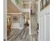 Inviting foyer with staircase, hardwood floors, and elegant decor at 25 Grange Way, Sharpsburg, GA 30277