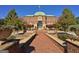 Impressive brick clubhouse with manicured grounds, offering a grand entrance and inviting atmosphere at 430 Rehobeth Way, Fayetteville, GA 30214