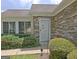 Close up of home entrance with stone facade, tidy landscaping, and visible address number at 430 Rehobeth Way, Fayetteville, GA 30214
