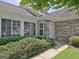 Inviting home entrance with stone accents, well-kept landscaping, and a welcoming front door at 430 Rehobeth Way, Fayetteville, GA 30214