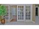 Inviting entryway featuring tiled floors and glass french doors leading to multiple rooms at 430 Rehobeth Way, Fayetteville, GA 30214