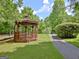Charming gazebo nestled in a beautifully landscaped yard, offering a serene retreat and peaceful ambiance at 430 Rehobeth Way, Fayetteville, GA 30214