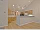 Kitchen featuring bar seating and ample cabinet space at 430 Rehobeth Way, Fayetteville, GA 30214