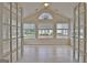 Sunroom featuring hardwood floors and multiple windows offering plenty of natural light at 430 Rehobeth Way, Fayetteville, GA 30214