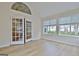 Sunroom featuring French door entry and large windows for plenty of natural light at 430 Rehobeth Way, Fayetteville, GA 30214
