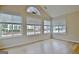 Bright sunroom featuring large windows with views of the yard at 430 Rehobeth Way, Fayetteville, GA 30214