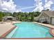 Community swimming pool featuring ample seating, a brick trim, and professionally manicured landscaping at 430 Rehobeth Way, Fayetteville, GA 30214