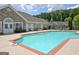 Inviting community pool, with clear blue water and a stone pool house, perfect for relaxation and recreation at 430 Rehobeth Way, Fayetteville, GA 30214