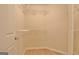 Walk-in closet featuring built-in shelving for ample storage solutions at 430 Rehobeth Way, Fayetteville, GA 30214