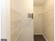 Walk-in closet with built-in shelving, racks, and neutral walls, providing ample storage space at 155 Glenwood Ln, Fayetteville, GA 30215