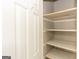 Walk-in closet with shelves at 155 Glenwood Ln, Fayetteville, GA 30215