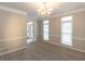 Spacious dining room with carpet, two windows and light neutral wall color at 155 Glenwood Ln, Fayetteville, GA 30215