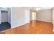 Living room featuring hardwood floors and an open layout at 155 Glenwood Ln, Fayetteville, GA 30215