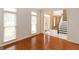 Bright living room showcases hardwood floors and large windows offering ample natural light at 155 Glenwood Ln, Fayetteville, GA 30215