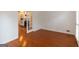 Living room featuring hardwood floors and french doors, perfect for entertaining or relaxing at 155 Glenwood Ln, Fayetteville, GA 30215