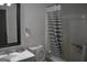 A functional bathroom with a shower, sink, and toilet at 3281 Nina Way, Douglasville, GA 30135