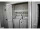 A laundry area features a washer and dryer for added convenience at 3281 Nina Way, Douglasville, GA 30135